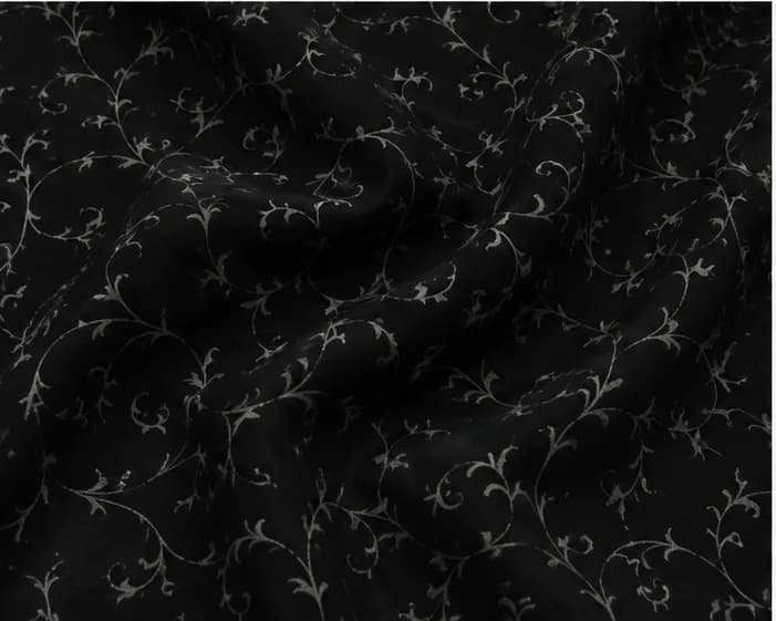 Black Floral Vine Printed Cotton Fabric On the bench